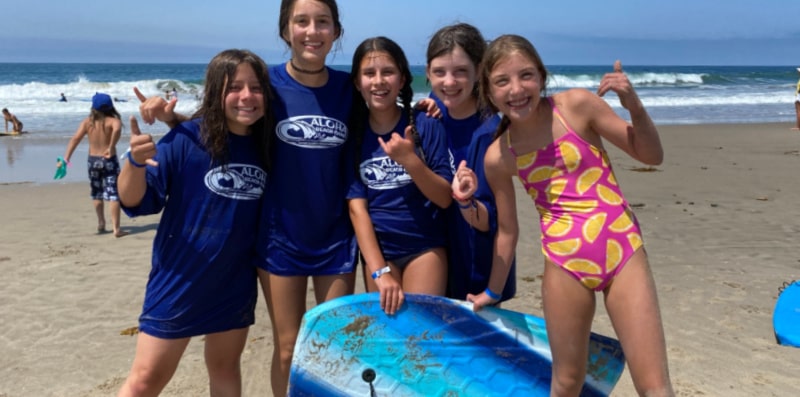 5 female campers on the sand at Aloha Beach Camp Summer Day Camp